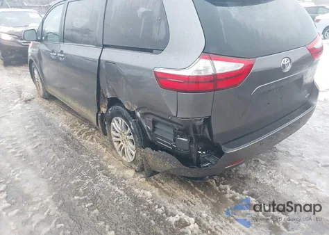 2015 Toyota Sienna Xle Premium 8 Passenger z USA, uszkodzony, nr VIN 5TDYK3DC7FS577343